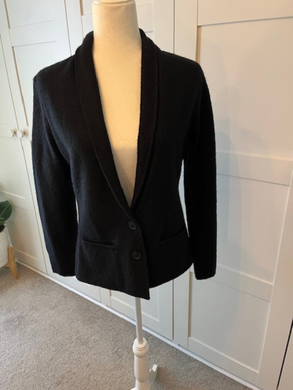 Ann Taylor felted (boiled) wool black button front cardigan with back ruffle.